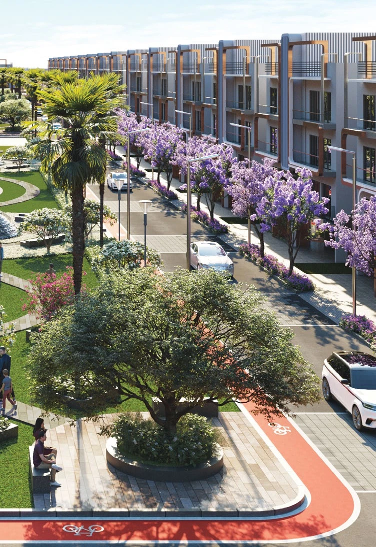 Tree-lined boulevard with linear greens at M3M City of Dreams, Panipat